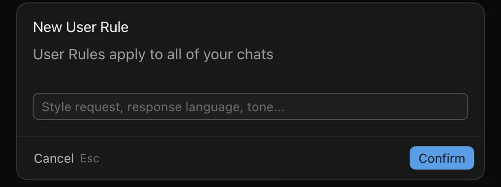 The New User Rule box in Cursor: a heading saying User Rules apply to all of your chats, a text field with the placeholder Style request, response language, tone, and Cancel and Confirm buttons
